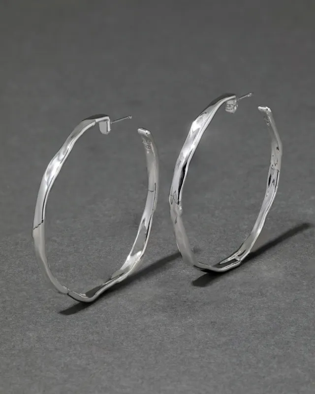 Brut Silver Skinny Hoop Earring sold by Alexis Bittar
