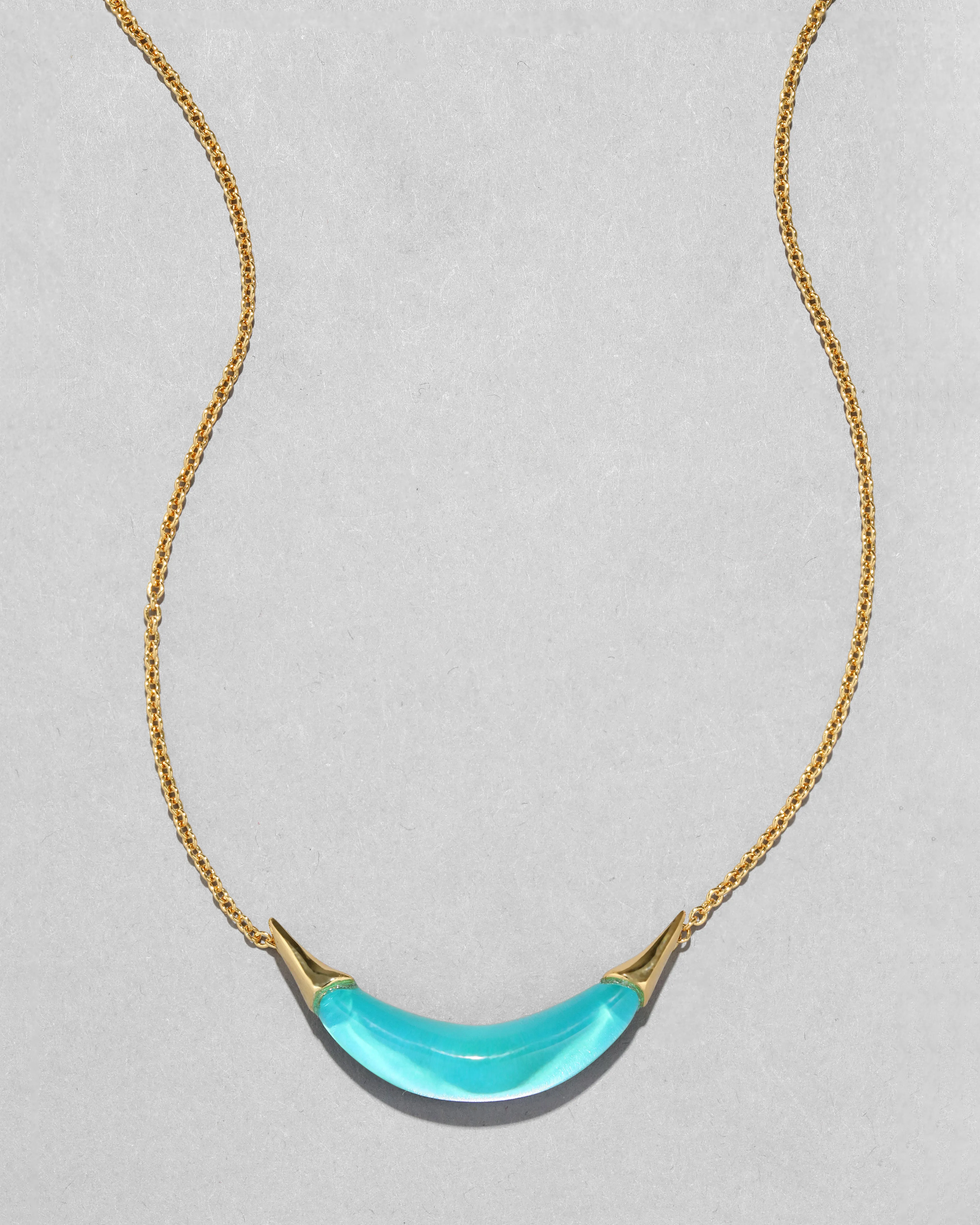 Gold Capped Crescent Lucite Necklace- Mediterranean Opal sold by Alexis Bittar