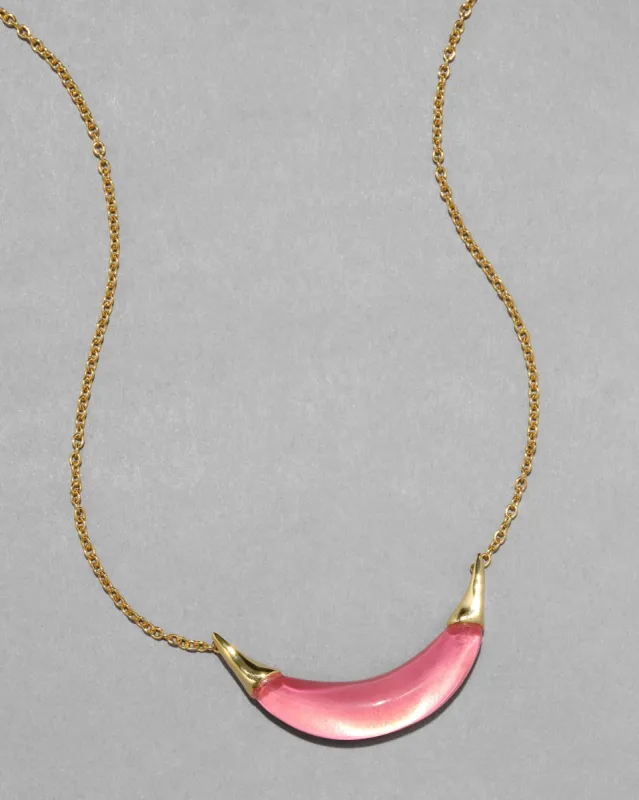 Gold Capped Crescent Lucite Necklace- Sweet Melon sold by Alexis Bittar