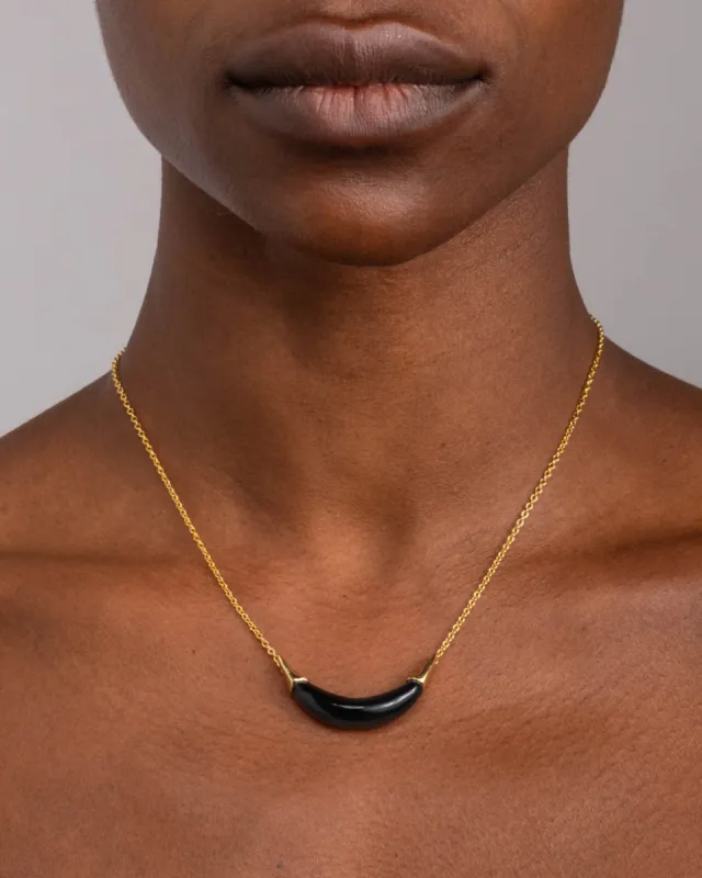 Gold Capped Crescent Lucite Necklace- Onyx sold by Alexis Bittar