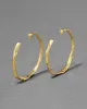 Brut Gold Skinny Hoop Earring sold by Alexis Bittar