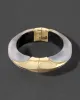 Luminous Lucite Claw Hinge Bracelet- Silver sold by Alexis Bittar