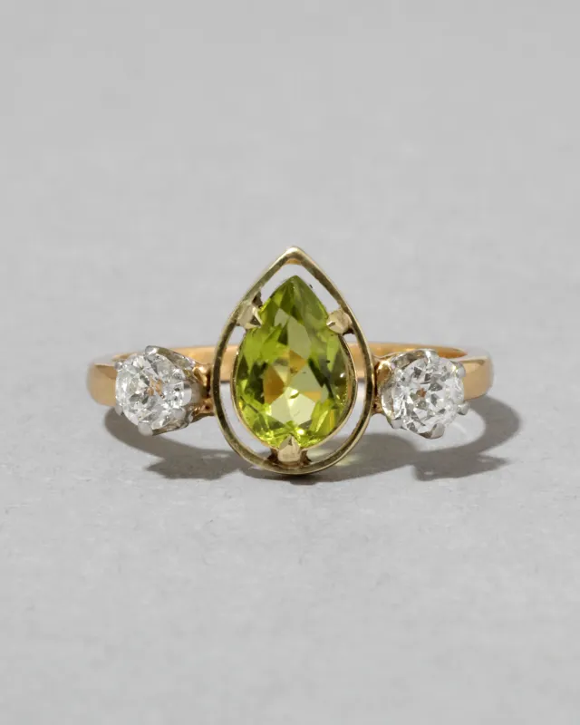 Antique Early 1900s 14k Gold & 18k Gold with Pear Cut Framed Peridot with Platinum Set Diamond Ring sold by Alexis Bittar