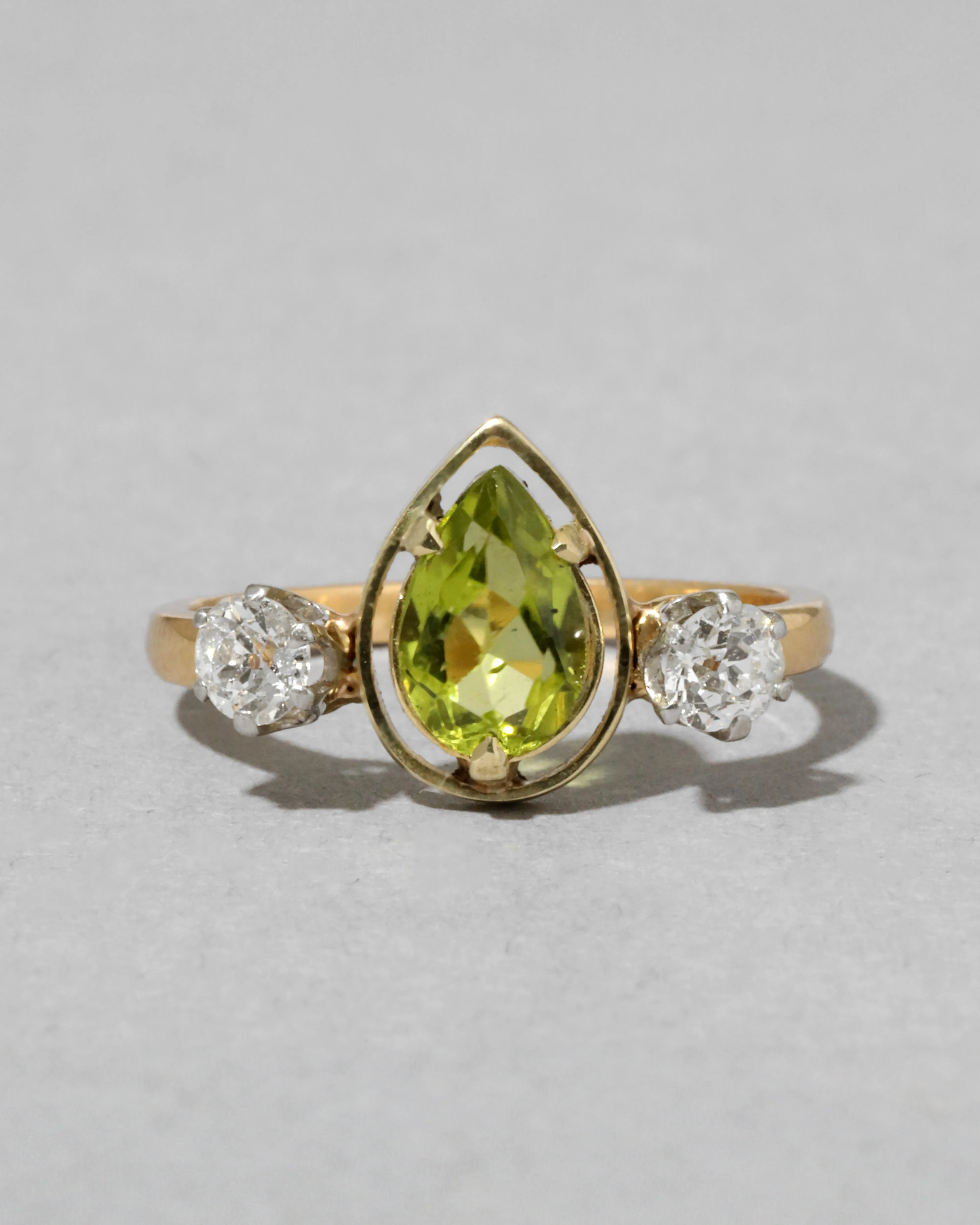 Antique Early 1900s 14k Gold & 18k Gold with Pear Cut Framed Peridot with Platinum Set Diamond Ring sold by Alexis Bittar