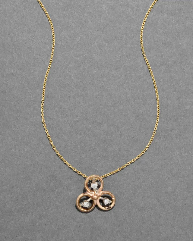 Vintage 1930s 14k Yellow & White Gold with Circular Diamond Pendant Necklace sold by Alexis Bittar