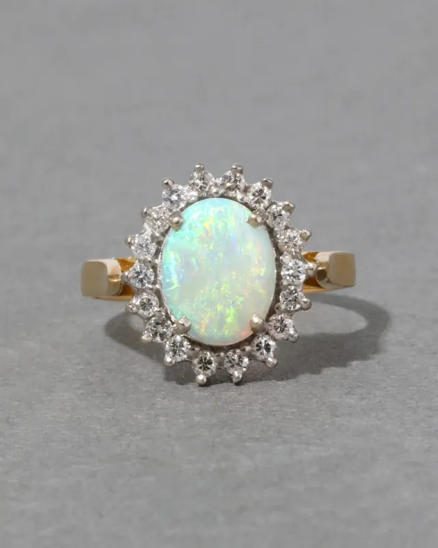Antique 1920s 18k Yellow & White Gold with Natural Opal & Diamond Halo Ring sold by Alexis Bittar