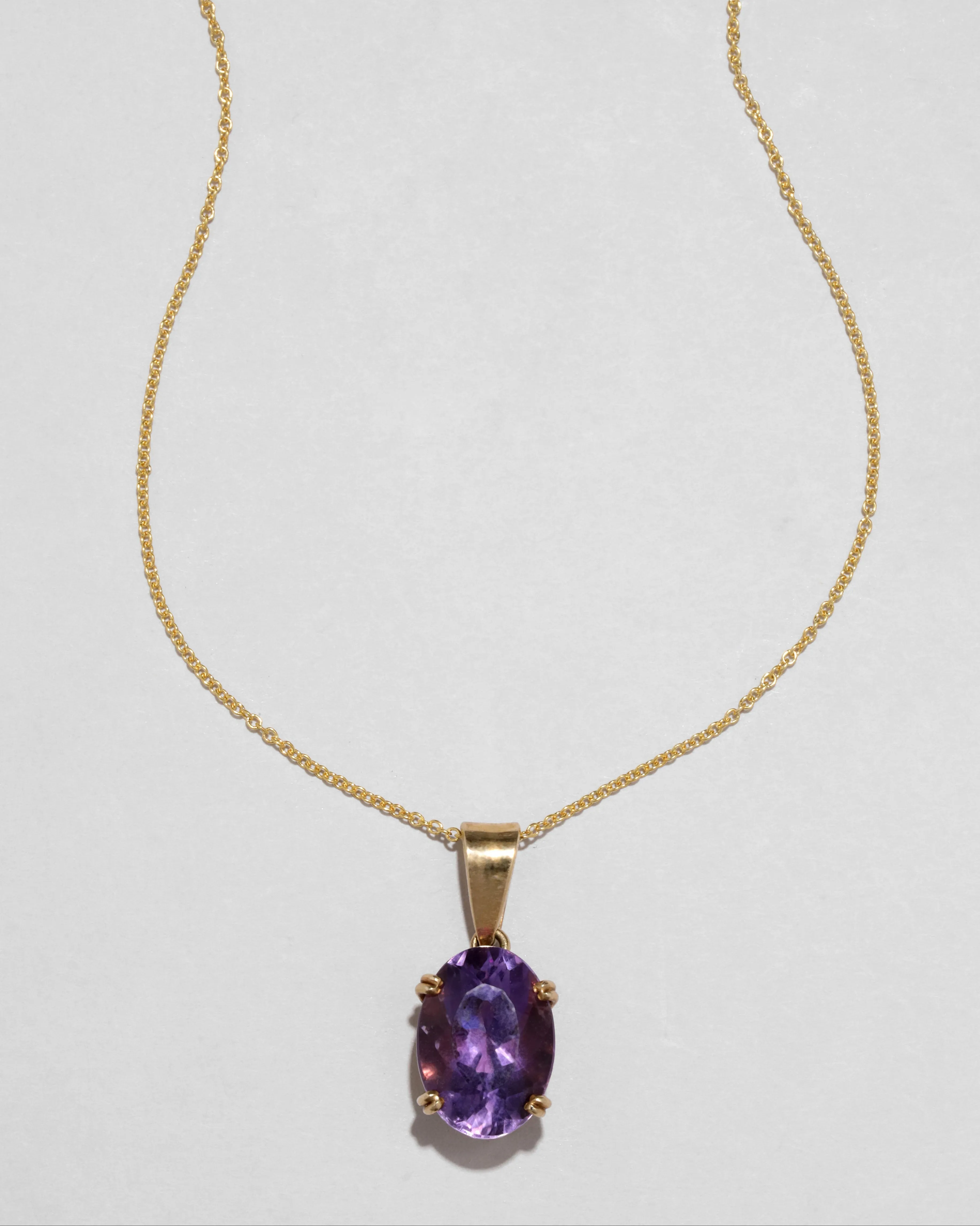 Vintage 1960s 14k Gold Prong Set Amethyst Pendant Necklace with Gold Bale sold by Alexis Bittar