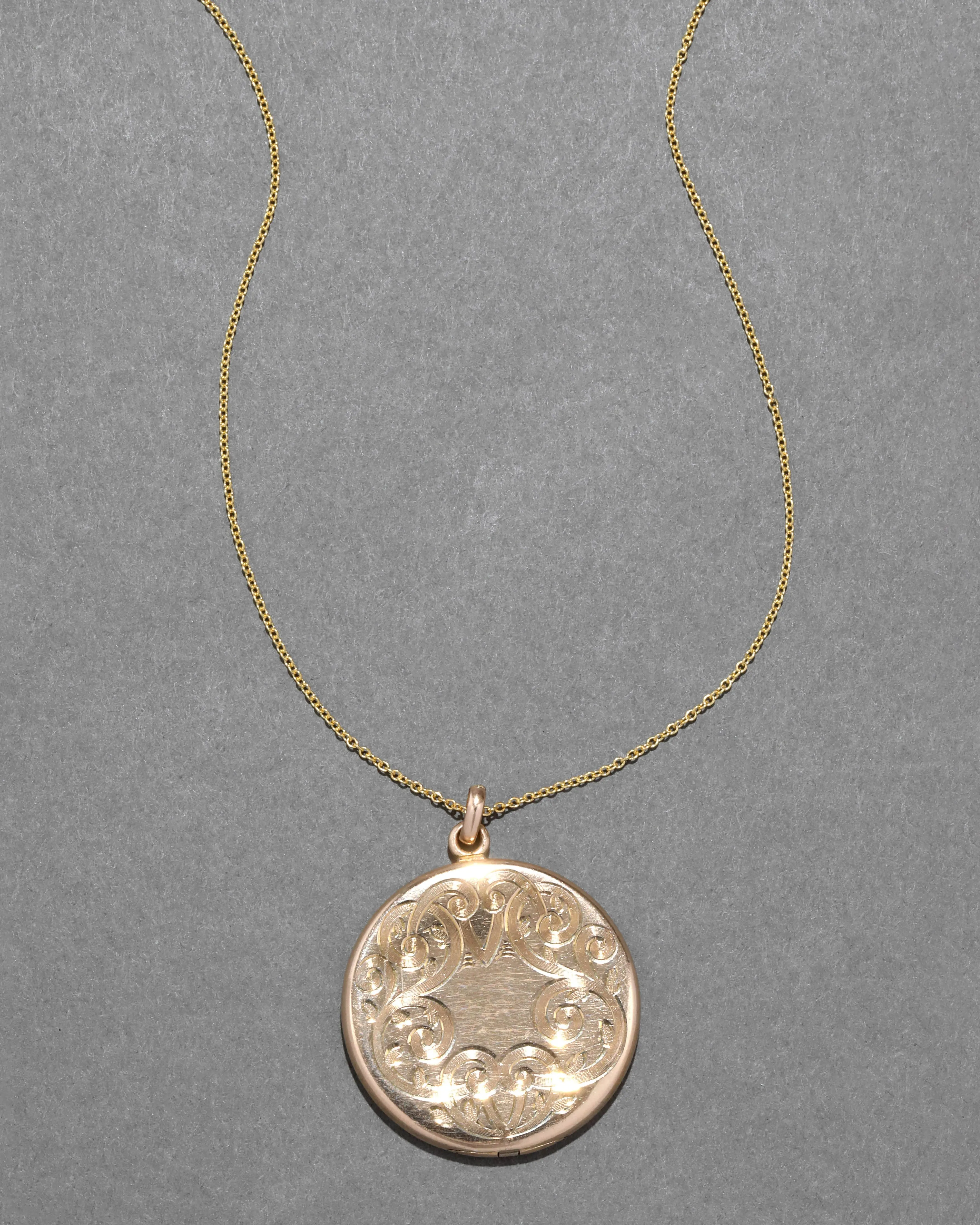 Antique 1880s 14k Gold Fill Hand Etched Swirl Locket Necklace sold by Alexis Bittar
