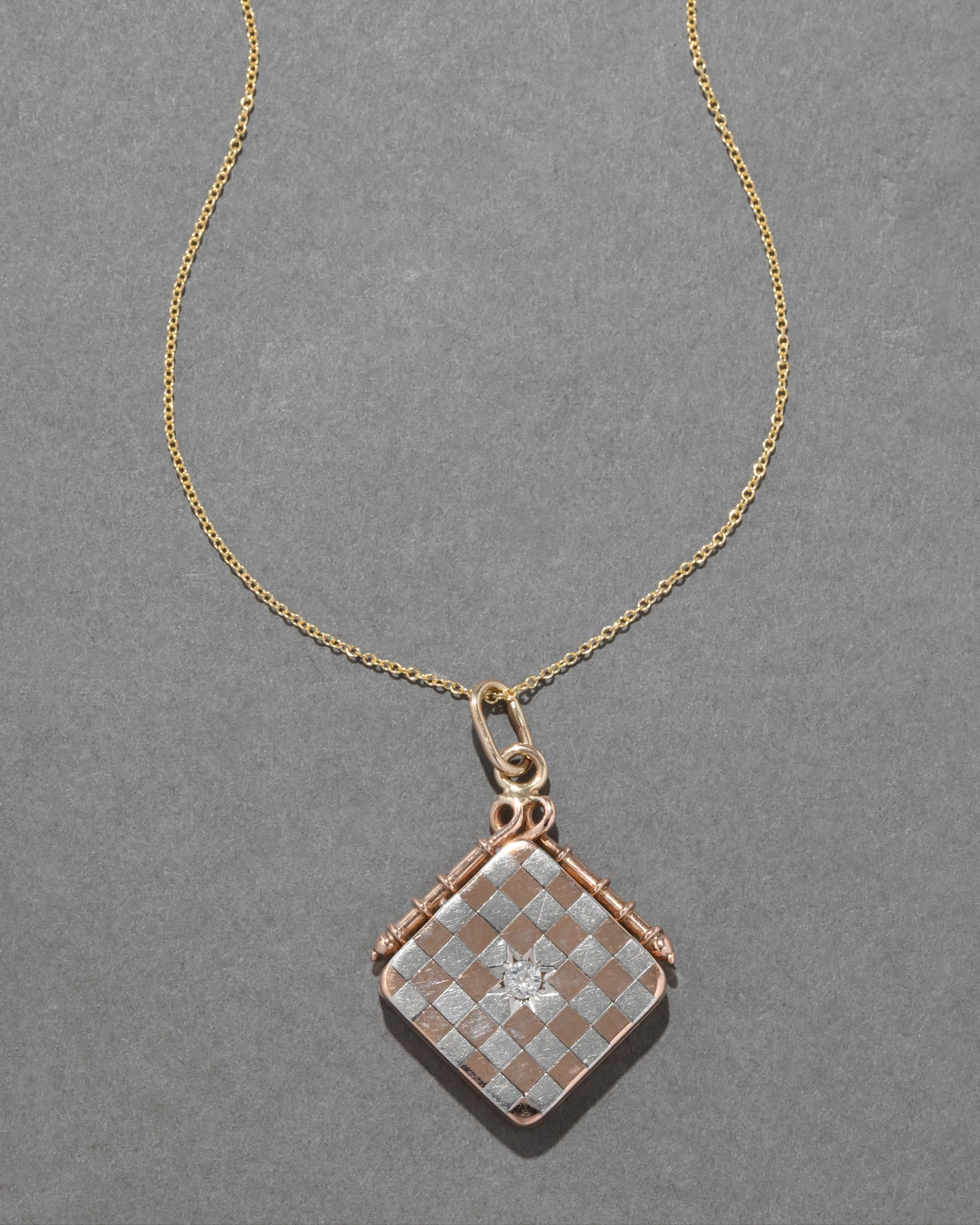 Vintage 14k Rose Gold & White Gold Two Tone Checkerboard with Diamond Locket Necklace sold by Alexis Bittar