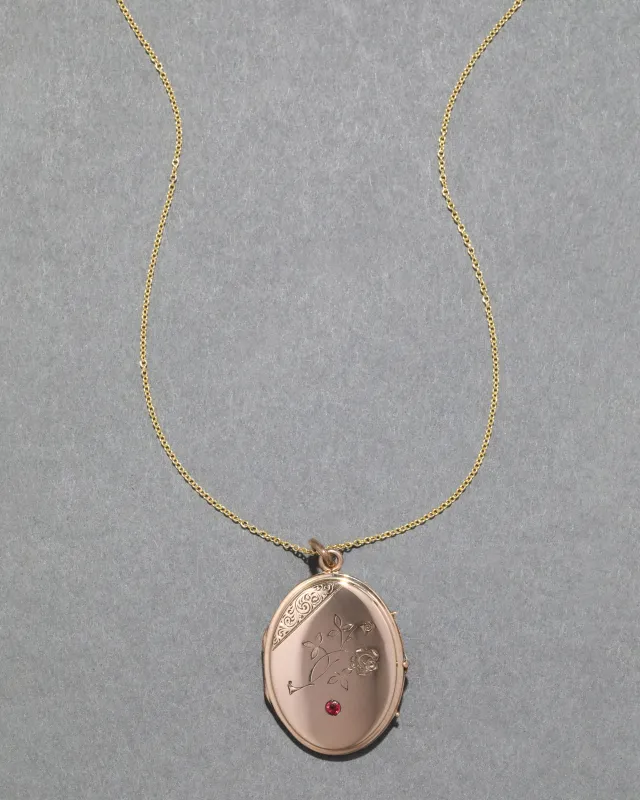 Antique 1800s 14k Gold with Ruby Hand Etched Floral Locket Necklace sold by Alexis Bittar
