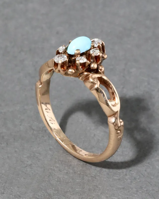 Vintage 14k Gold with Oval Turquoise Surrounded by Diamonds in Delicate Setting Ring sold by Alexis Bittar