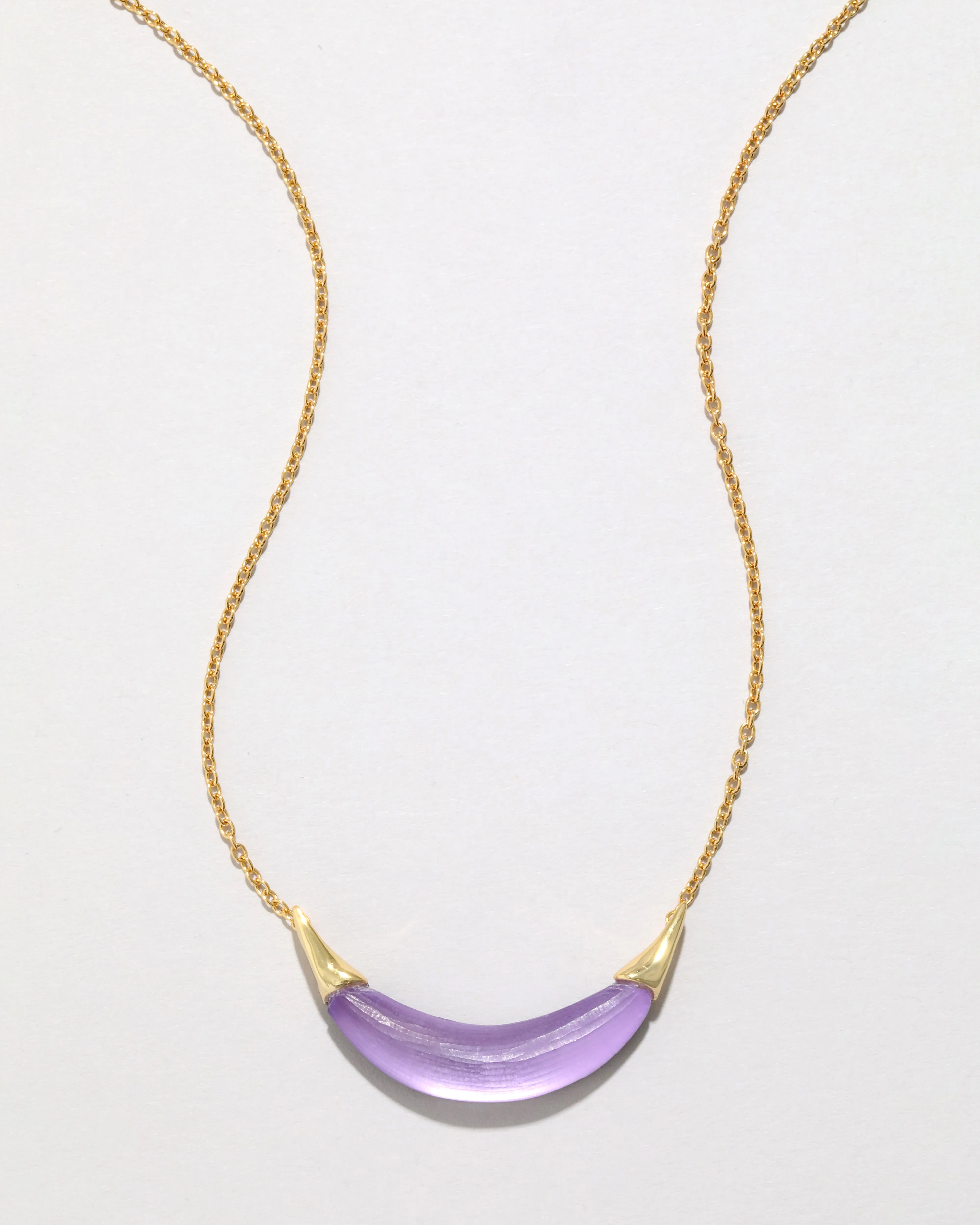 Gold Capped Crescent Lucite Necklace- Amethyst sold by Alexis Bittar
