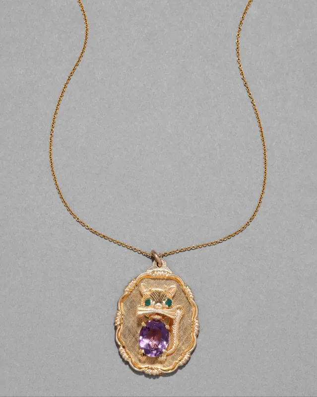 Vintage 1980s 14k Gold with Emerald & Faceted Amethyst Kitschy Cat Pendant Necklace sold by Alexis Bittar