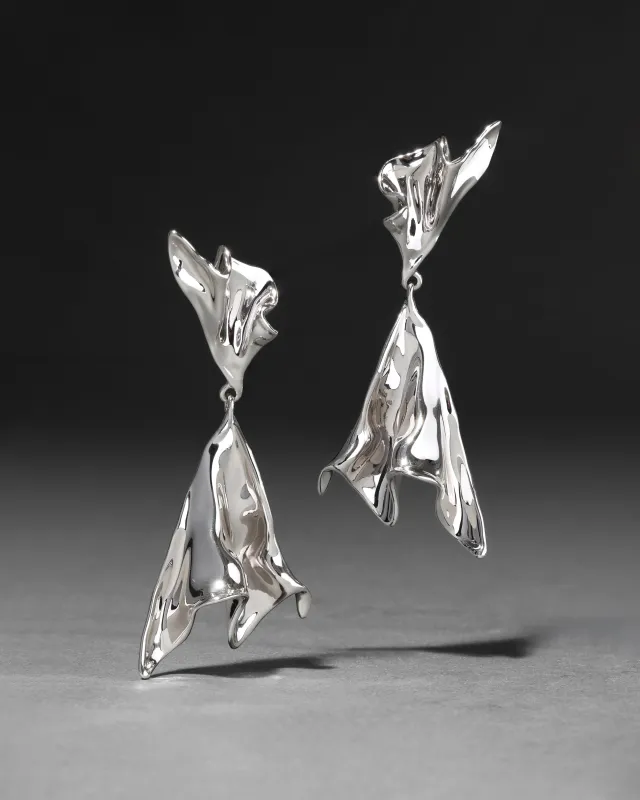 Molten Silver Flared Drop Earring sold by Alexis Bittar
