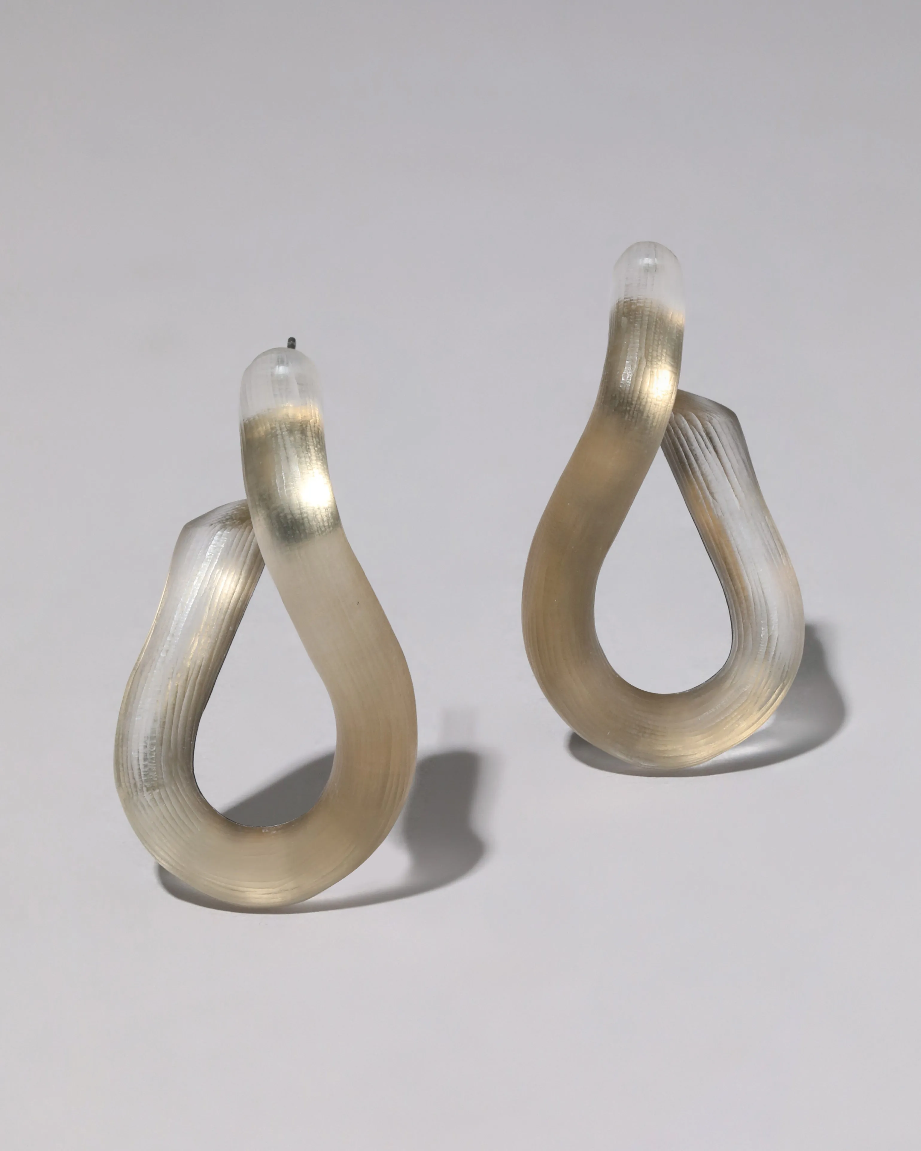 Lucite Twist Hoop Earring- Warm Grey sold by Alexis Bittar