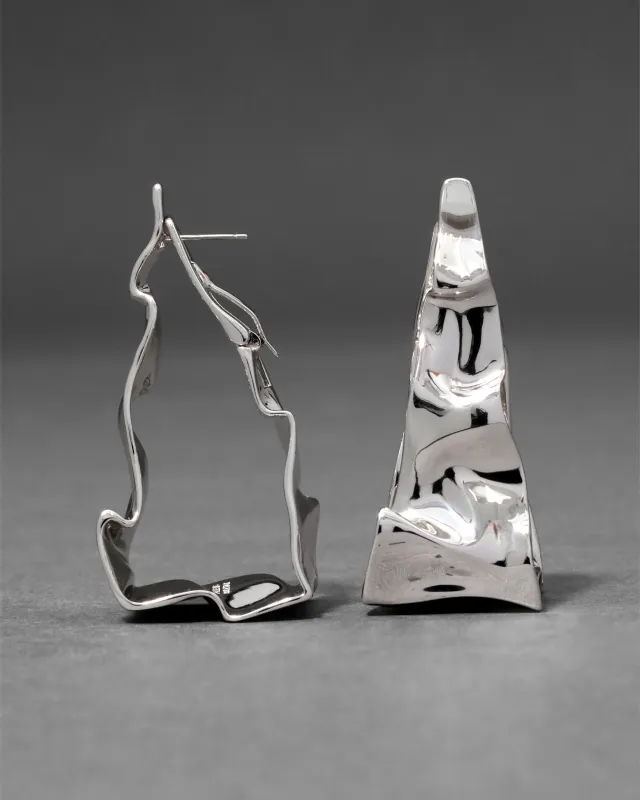 Crumpled Silver Tapered Hoop Earring sold by Alexis Bittar