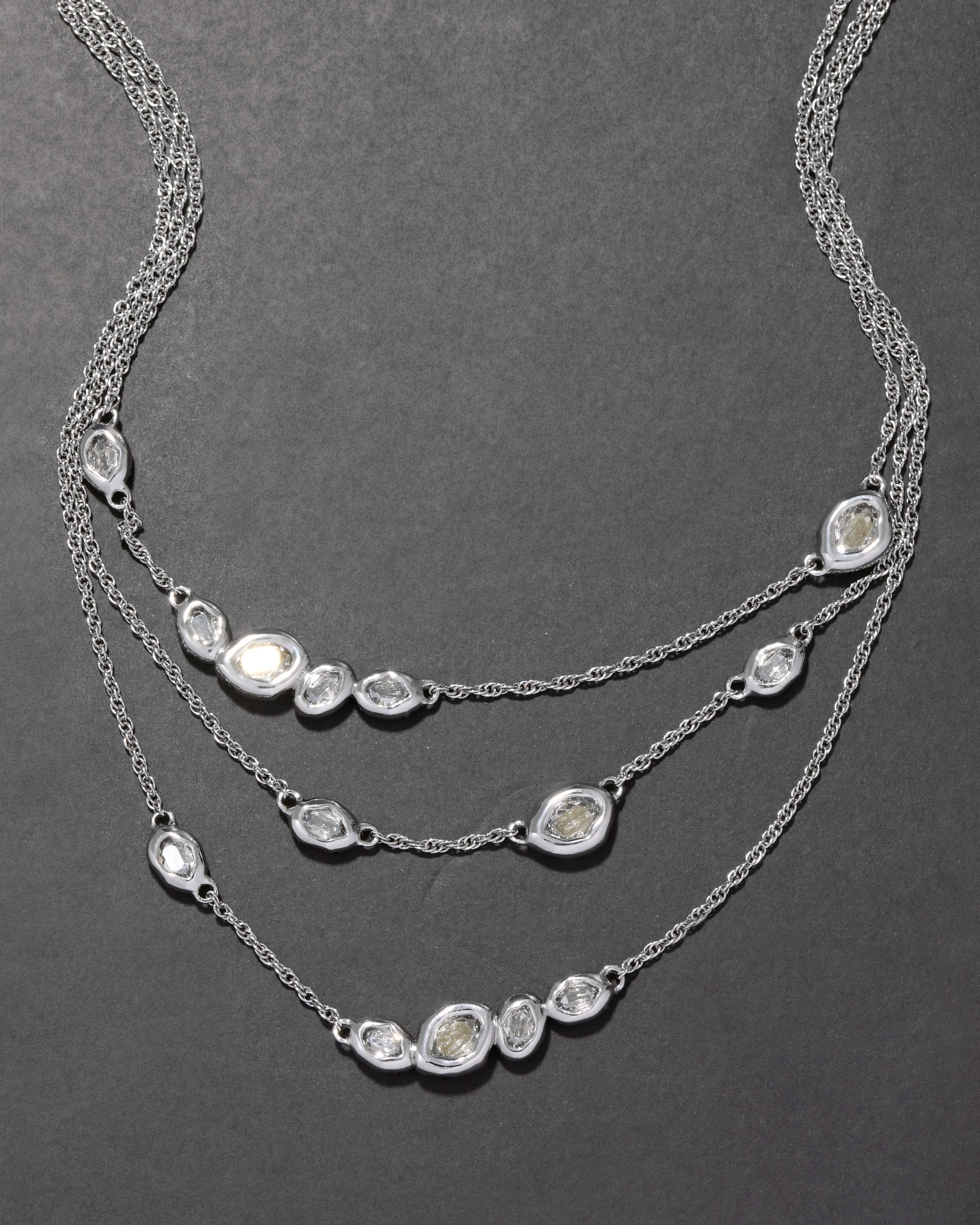Layered Molten Silver Crystal Station Necklace sold by Alexis Bittar