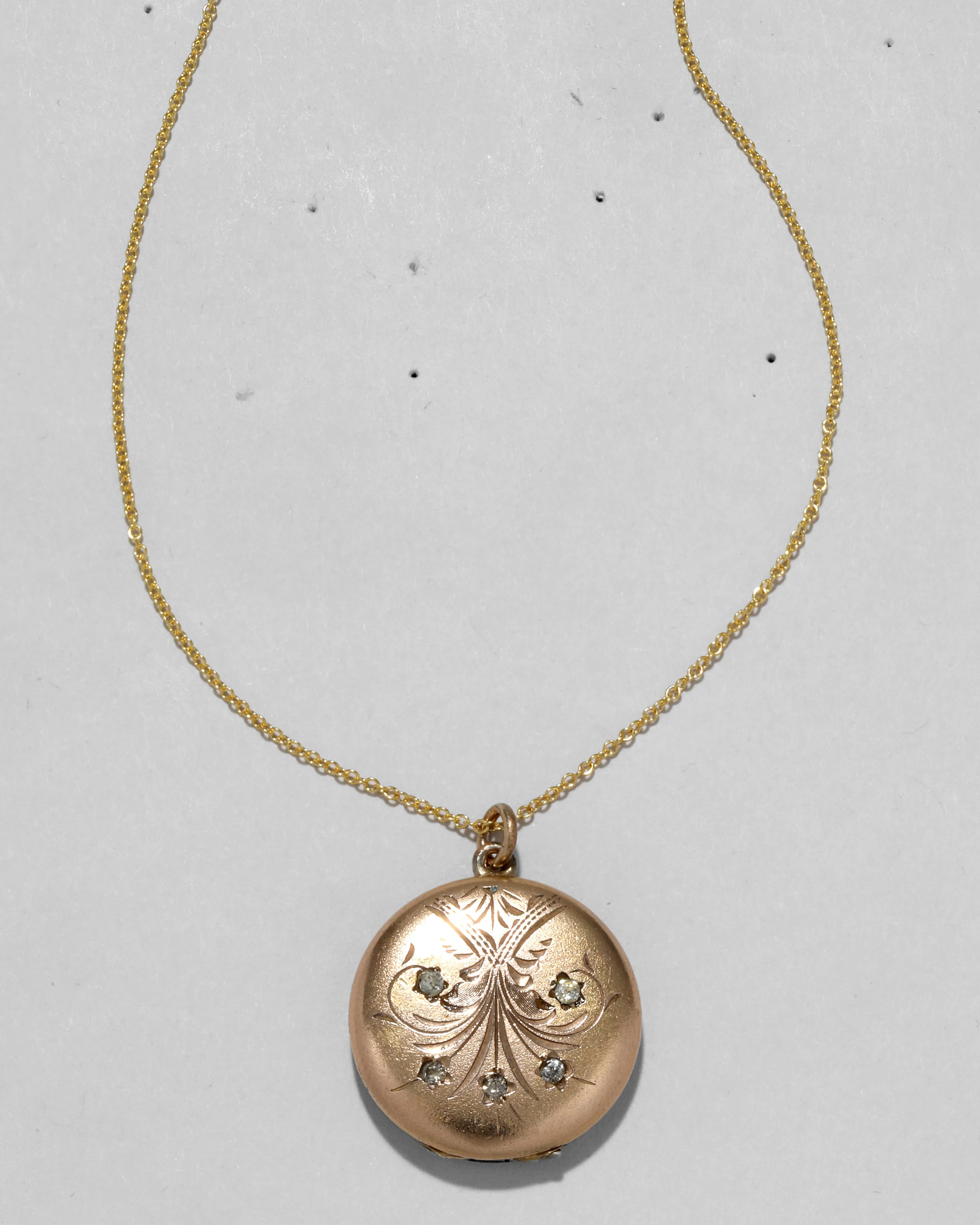 Antique 1910s 14k Gold Filled Crystal Set Flower Circle Locket Necklace sold by Alexis Bittar