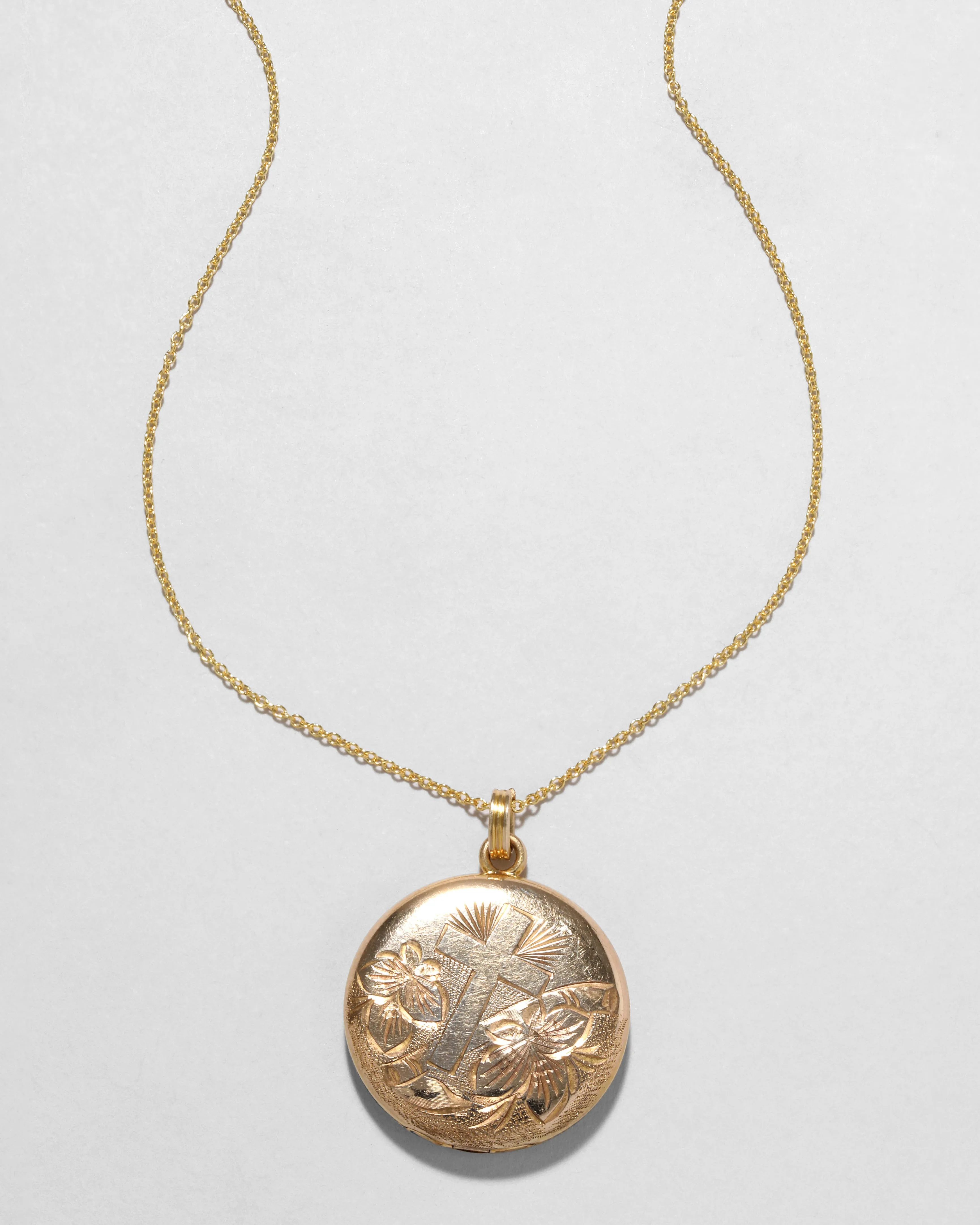 Vintage 1940s 14k Gold Filled Etched Circle Locket Necklace sold by Alexis Bittar