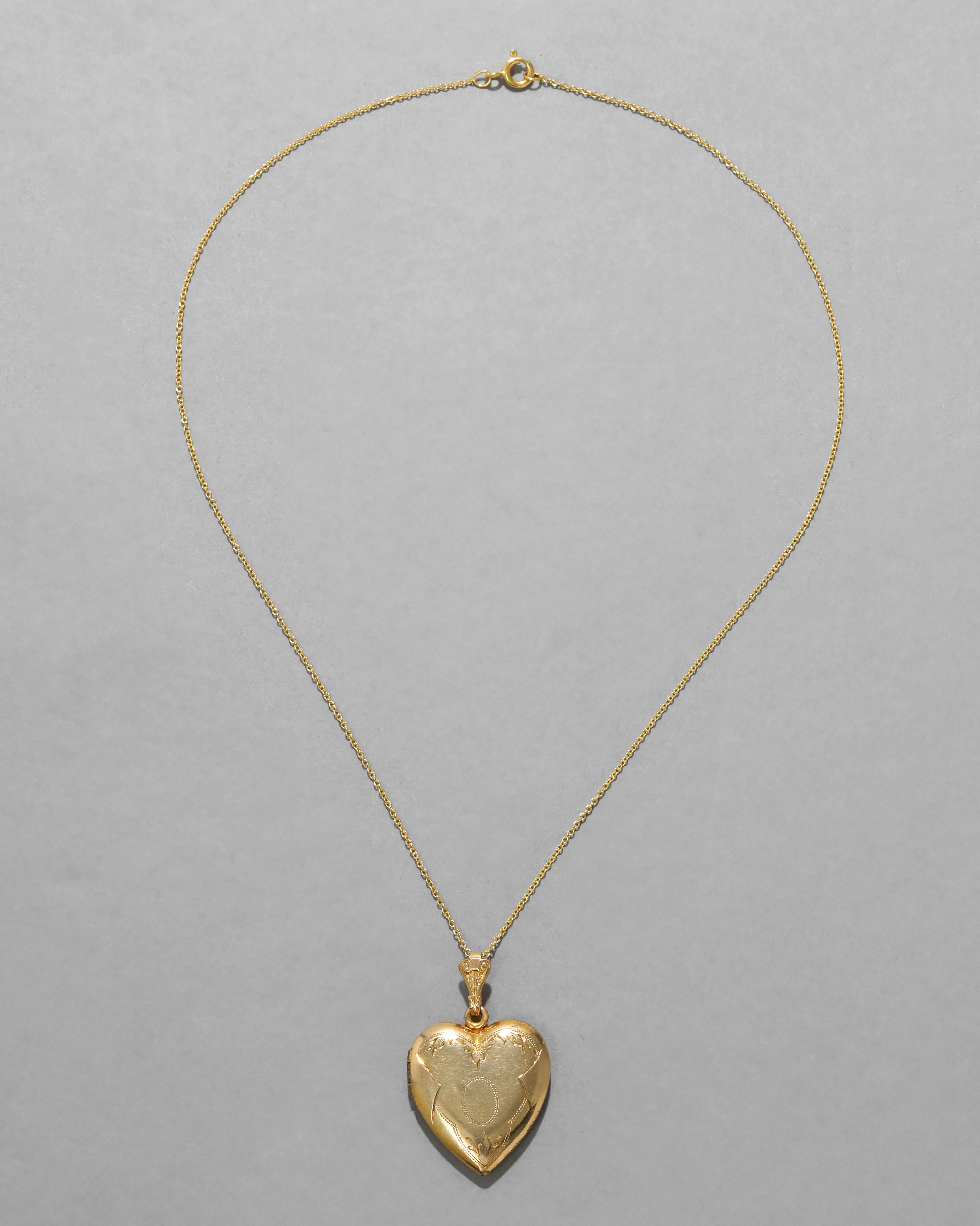 Vintage 1940s 12k Gold Filled Etched Floral Frame Design Heart Locket Necklace sold by Alexis Bittar