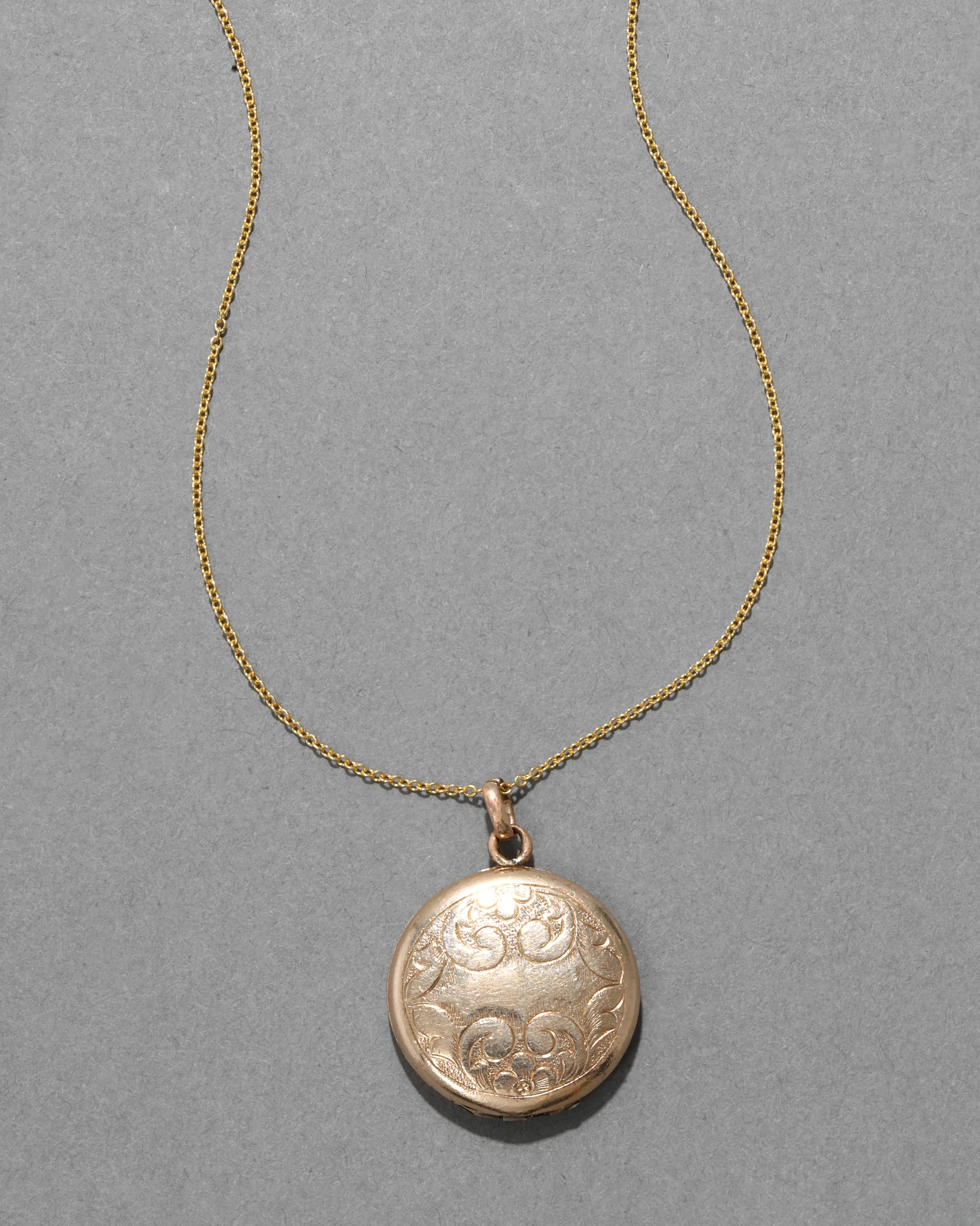 Antique 1800s 14k Gold Filled Floral Etched Circle Locket Necklace sold by Alexis Bittar