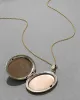 Vintage 1950s 14k Gold Filled 3D Rose Oval Locket Necklace sold by Alexis Bittar