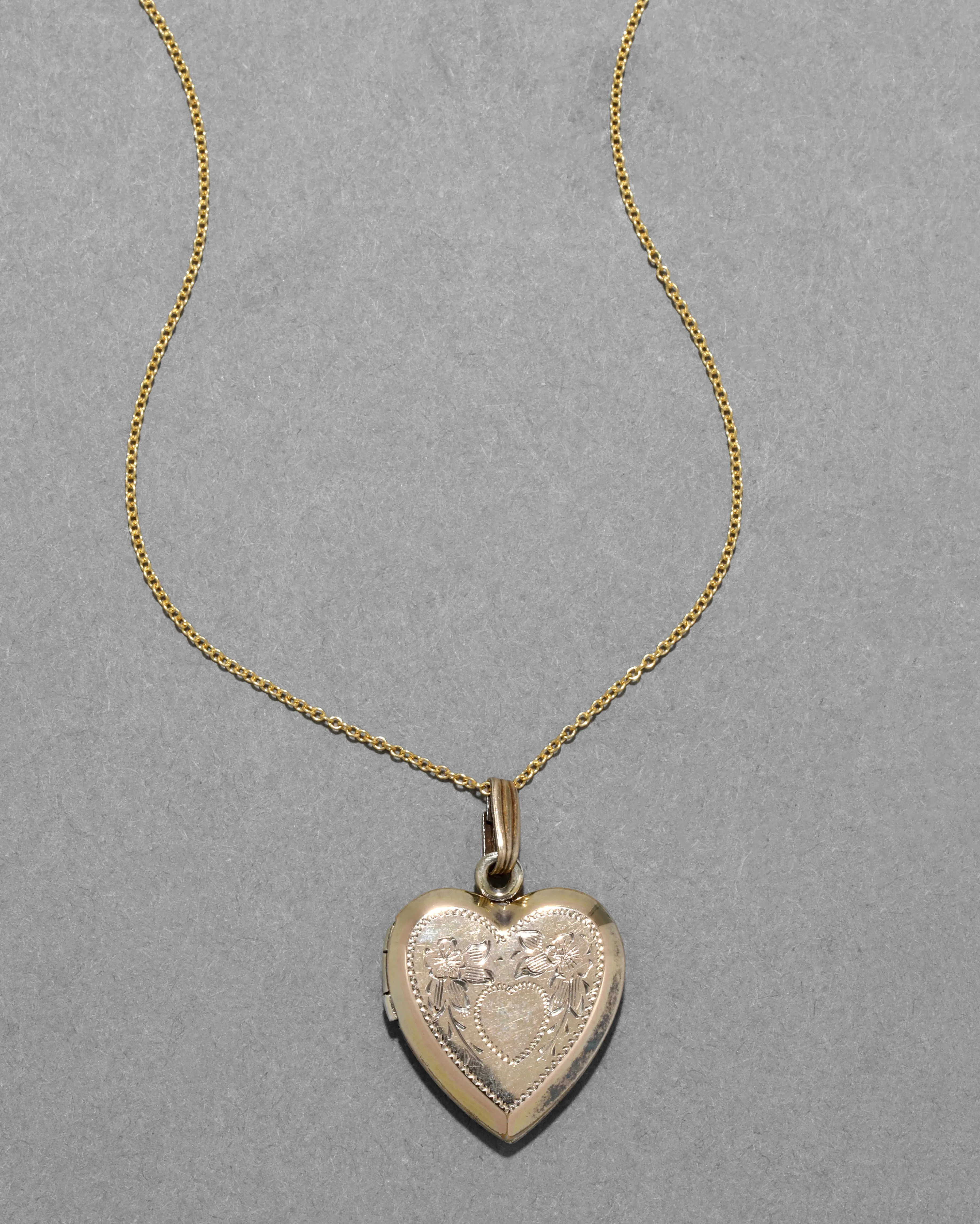 Antique 1920s 14k Gold Filled Etched Flower Framed Heart in Heart Shaped Locket Necklace sold by Alexis Bittar