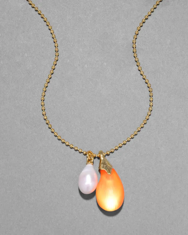 Lucite Teardrop Freshwater Pearl Pendant Necklace- Neon Orange sold by Alexis Bittar