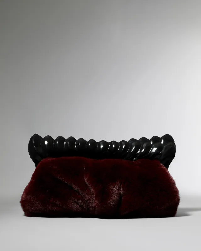The Pouf Clutch- Merlot sold by Alexis Bittar