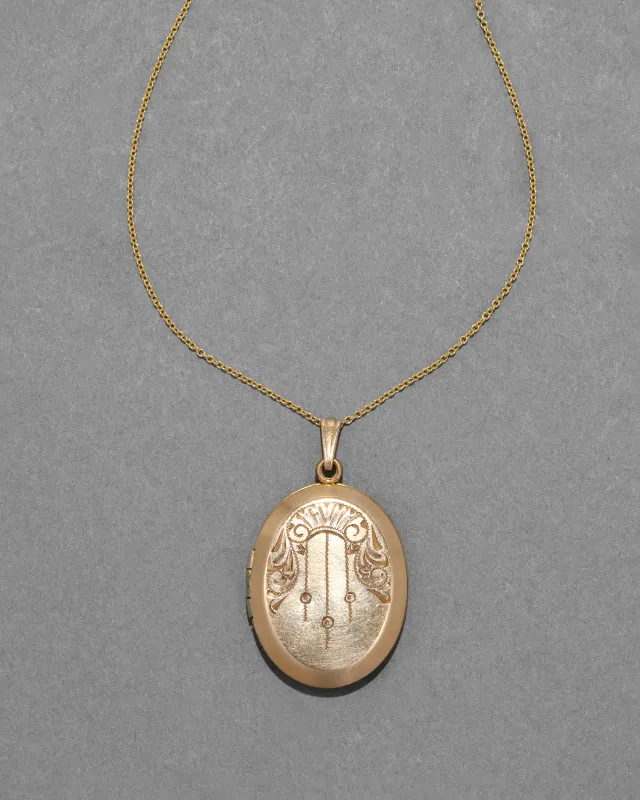 Antique 1800s 10k Gold Filled Etched Oval Locket Necklace sold by Alexis Bittar
