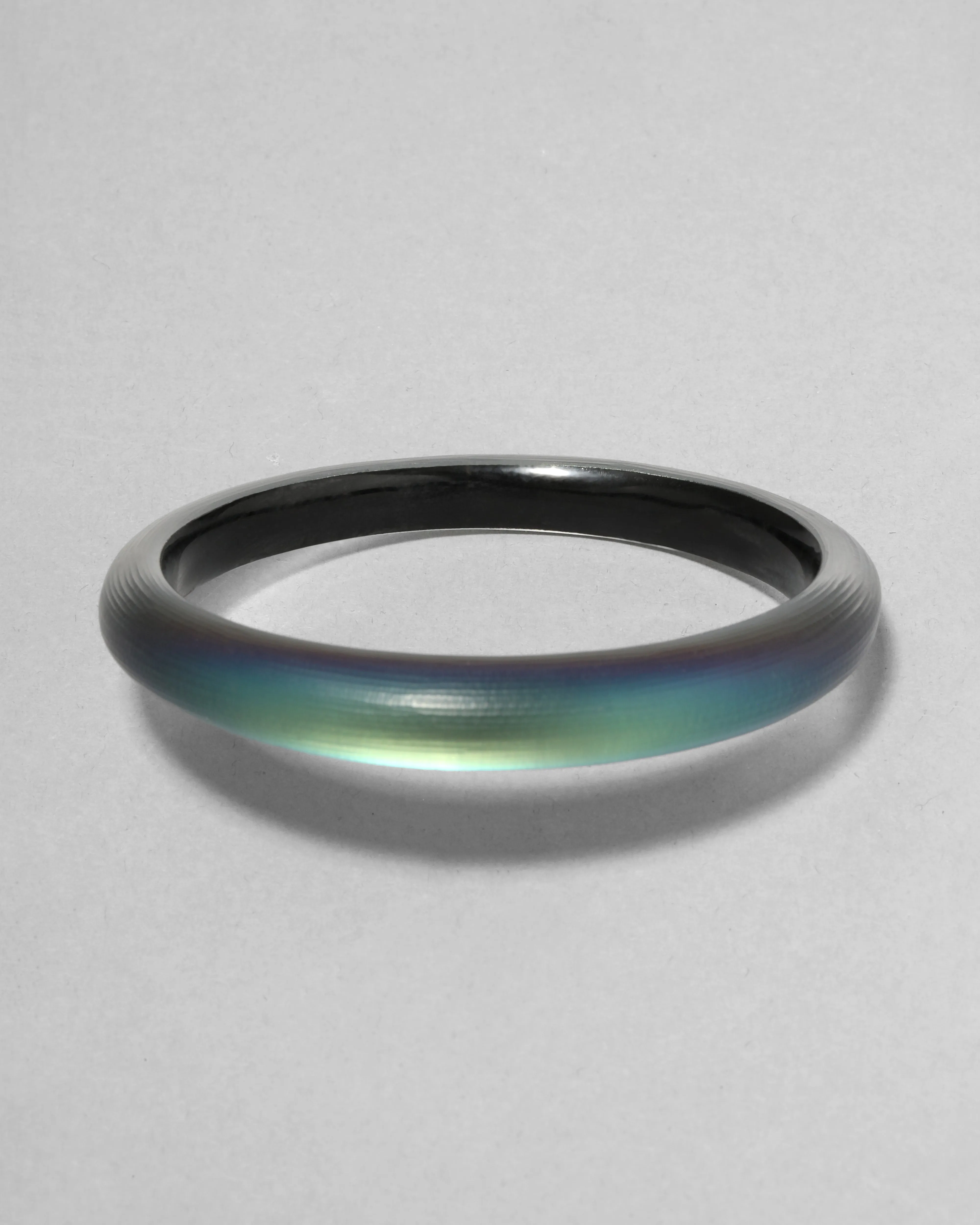 Lucite Skinny Bangle Bracelet- Black Beetle sold by Alexis Bittar