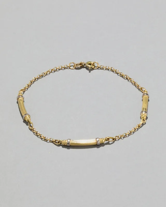Vintage 1980s 18k Yellow & White Gold Two Tone Ribbed Station Bracelet sold by Alexis Bittar