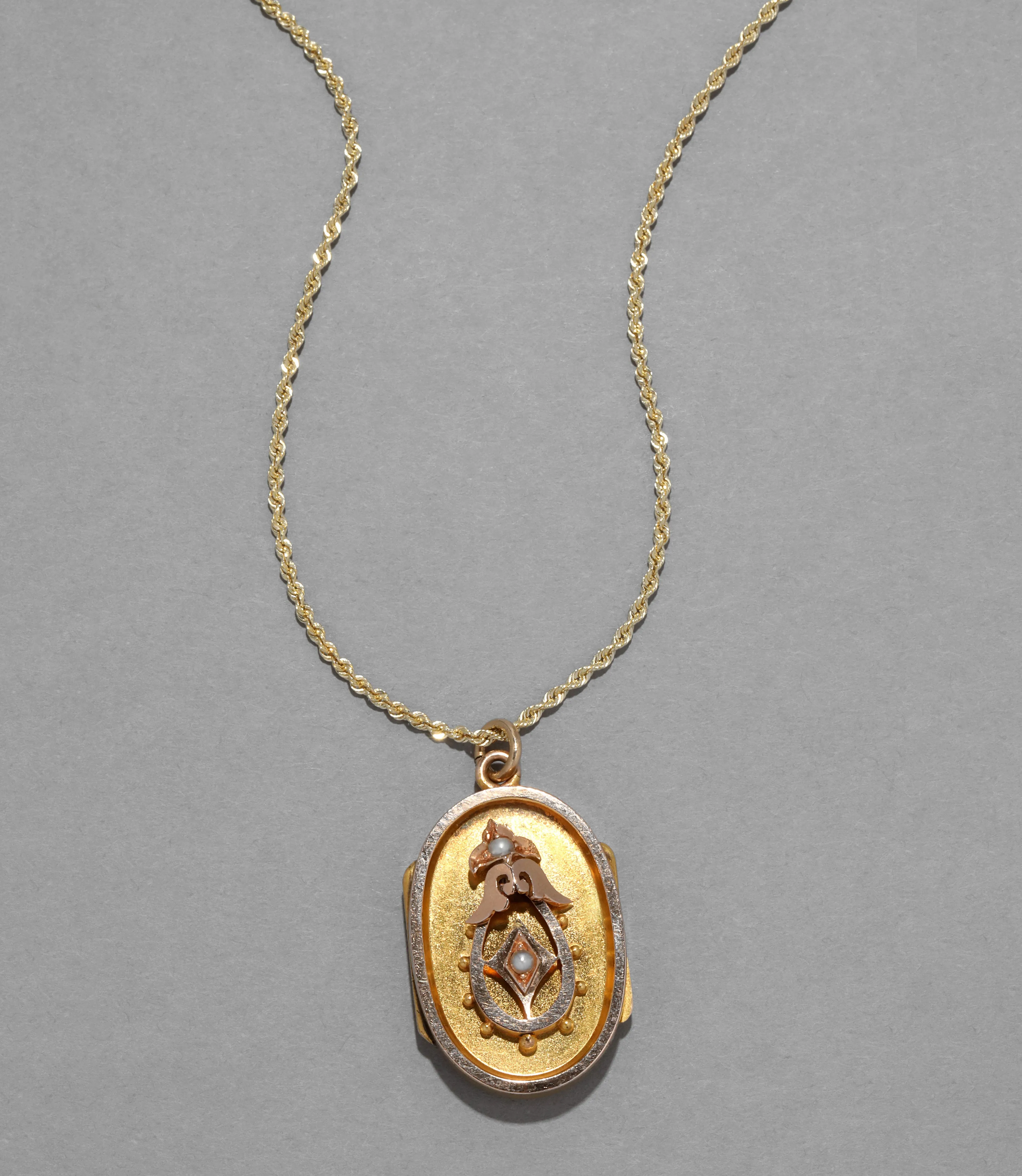 Antique Victorian 1800s 14k Gold Locket Necklace with Pearl on French Rope Chain sold by Alexis Bittar