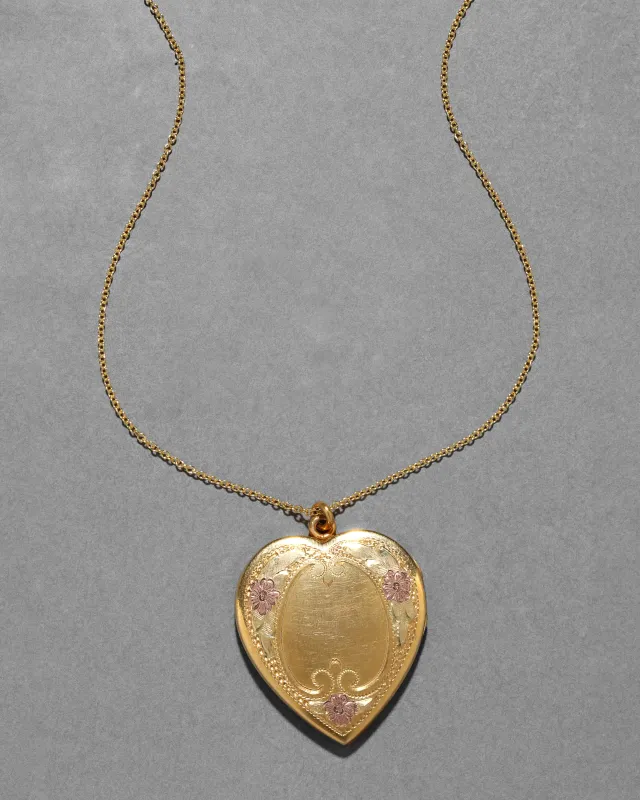 Antique 1910 14k Gold Fill Tri Color Hand Etched Heart Locket sold by Alexis Bittar