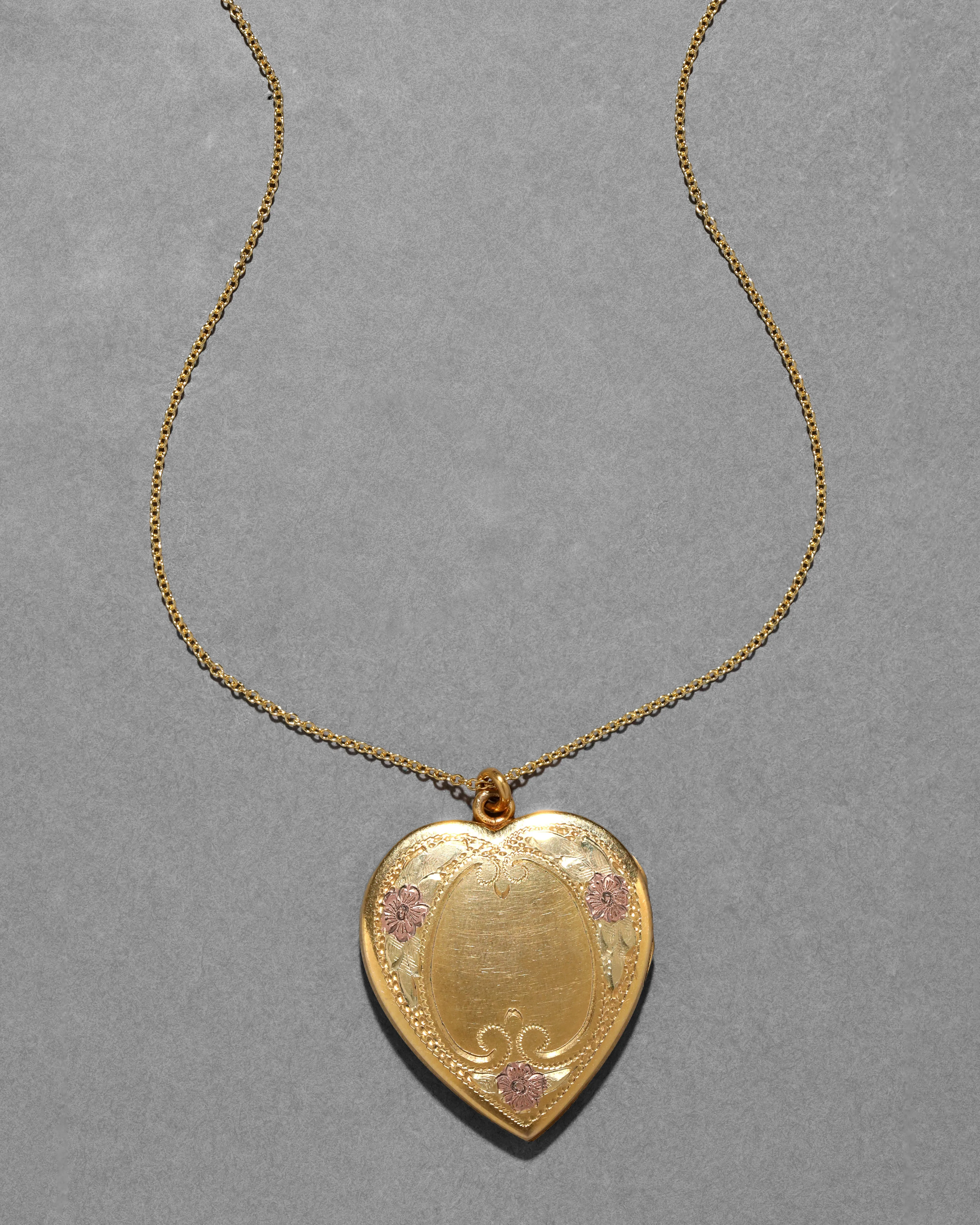 Antique 1910 14k Gold Fill Tri Color Hand Etched Heart Locket sold by Alexis Bittar