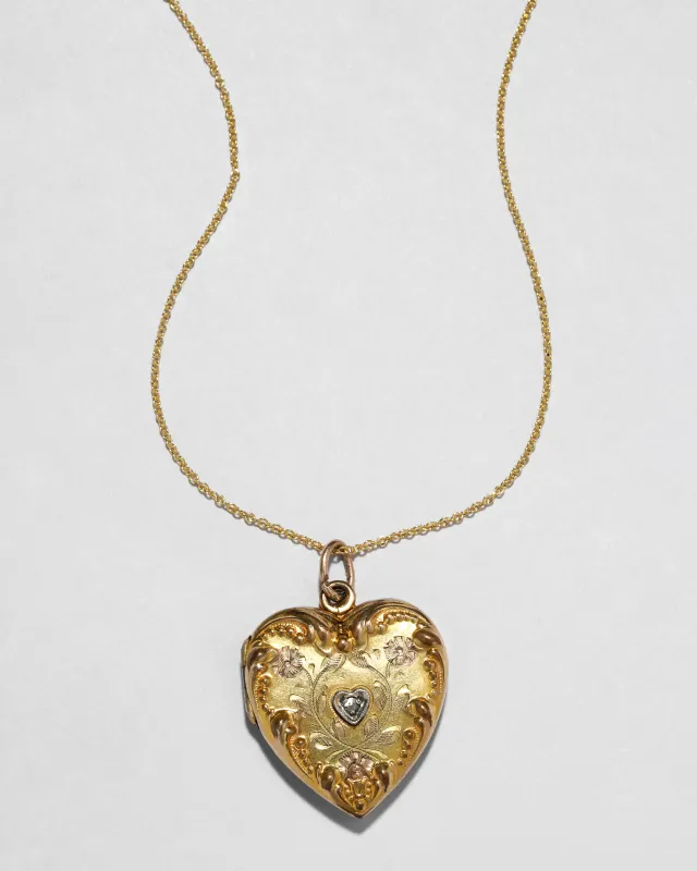Antique Late 1800s 14k Gold Fill Art Nouveau Hand Etched Heart Locket Necklace sold by Alexis Bittar