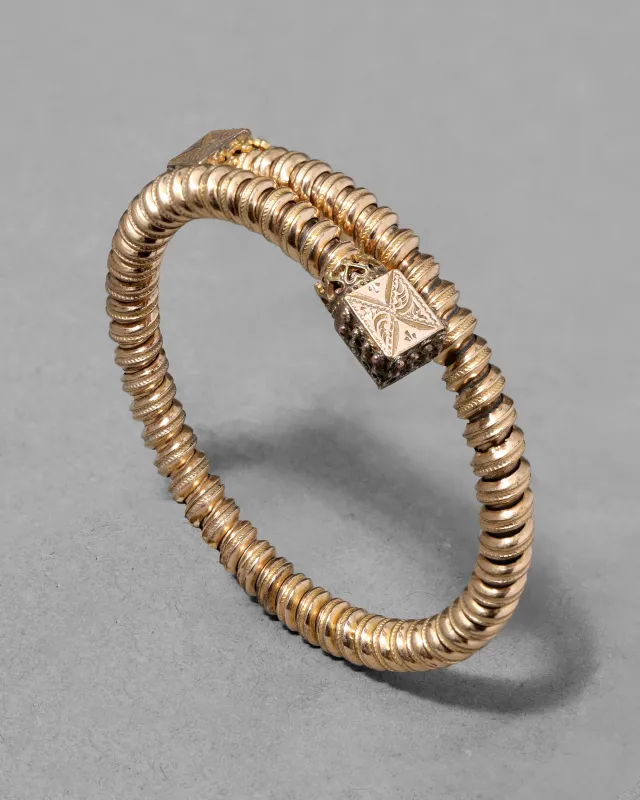 Antique Victorian 14k Gold Fill Hand Etched Coil Bracelet sold by Alexis Bittar