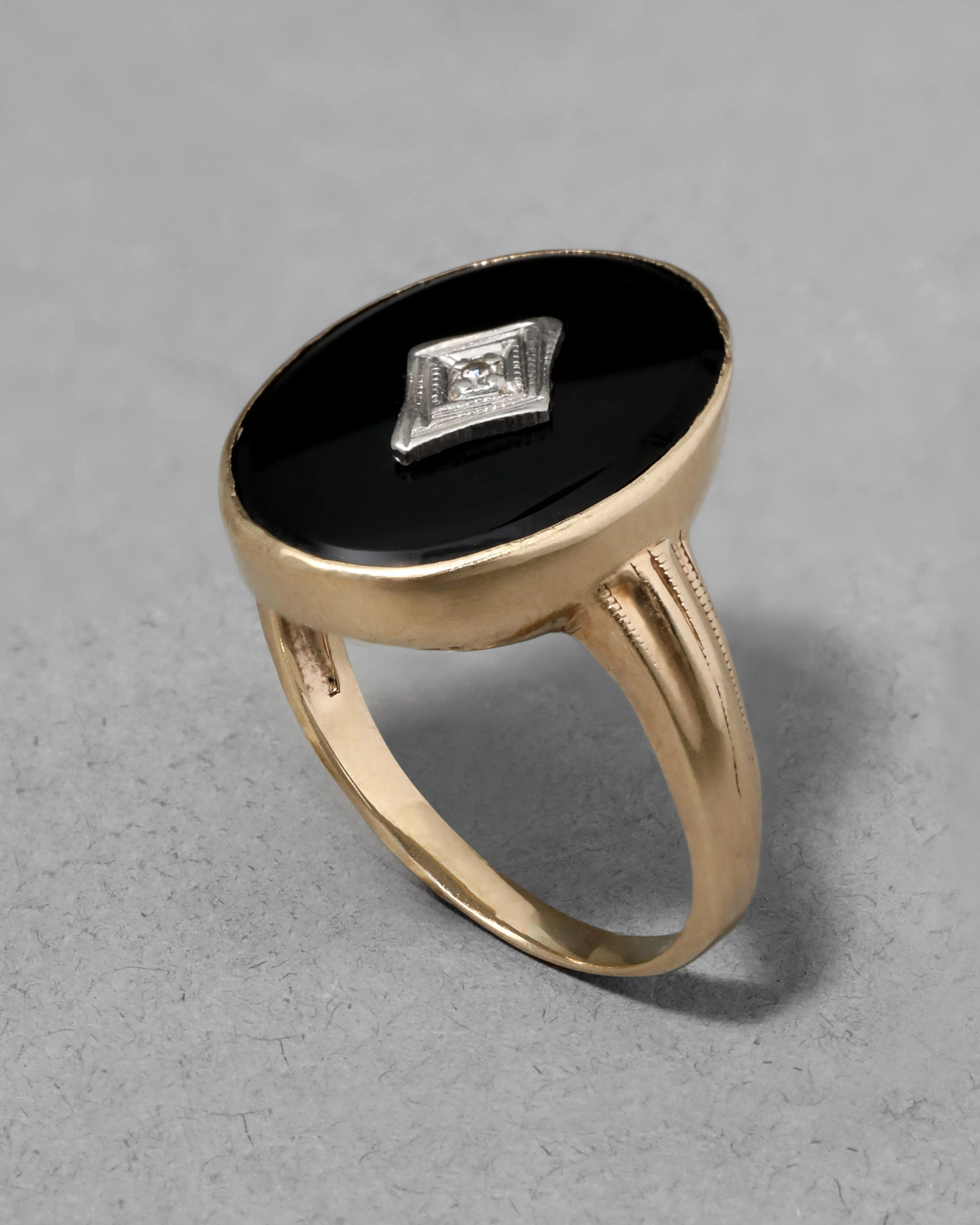 Antique 1910s 14k Yellow & White Gold Oval Onyx with Framed Diamond Center Ring sold by Alexis Bittar