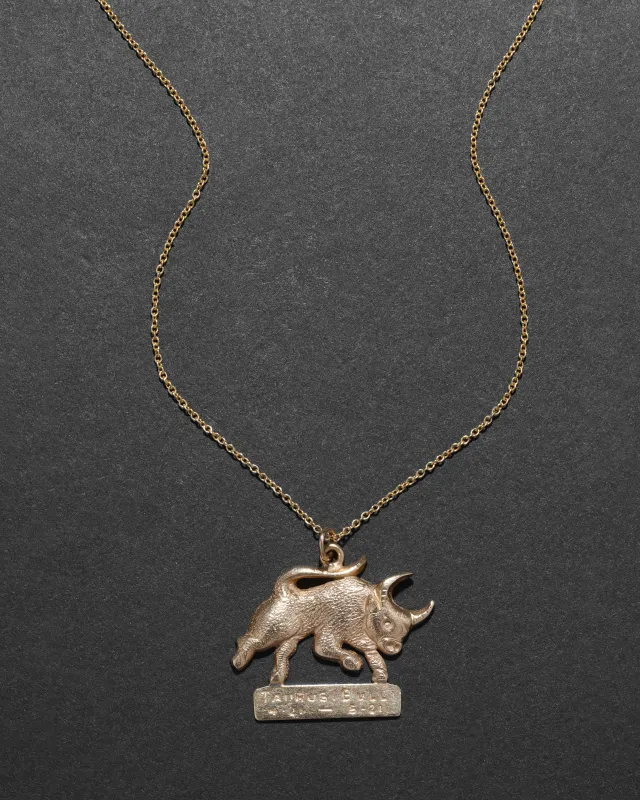Vintage 1970s 14k Gold Hand Etched Taurus Bull Pendant Necklace sold by Alexis Bittar