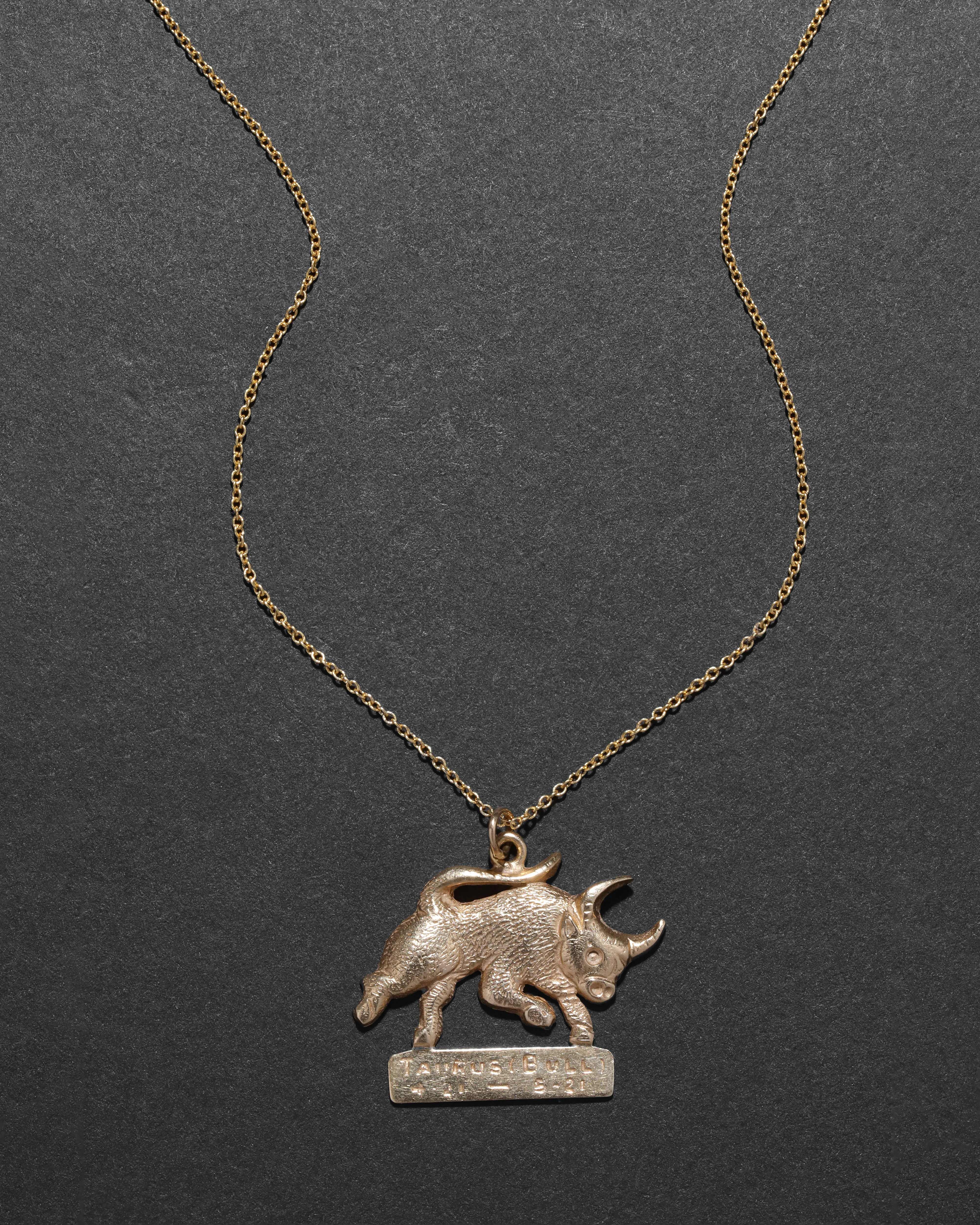 Vintage 1970s 14k Gold Hand Etched Taurus Bull Pendant Necklace sold by Alexis Bittar