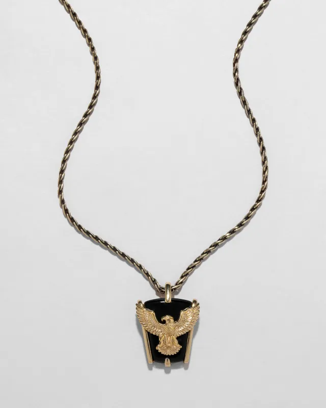 Vintage 1940s 10k Gold Eagle Onyx Base Pendant Necklace sold by Alexis Bittar