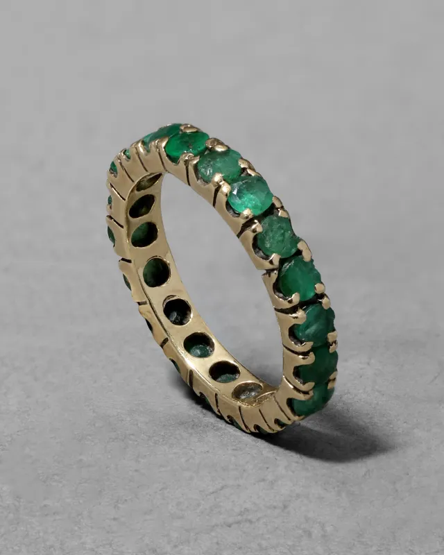 Vintage 1970s 14k Gold with Emerald Custom Made Eternity Band Ring sold by Alexis Bittar