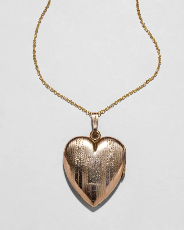 Antique 1920s 14k Gold Filled Engraved Pinstriped Heart Locket Necklace sold by Alexis Bittar