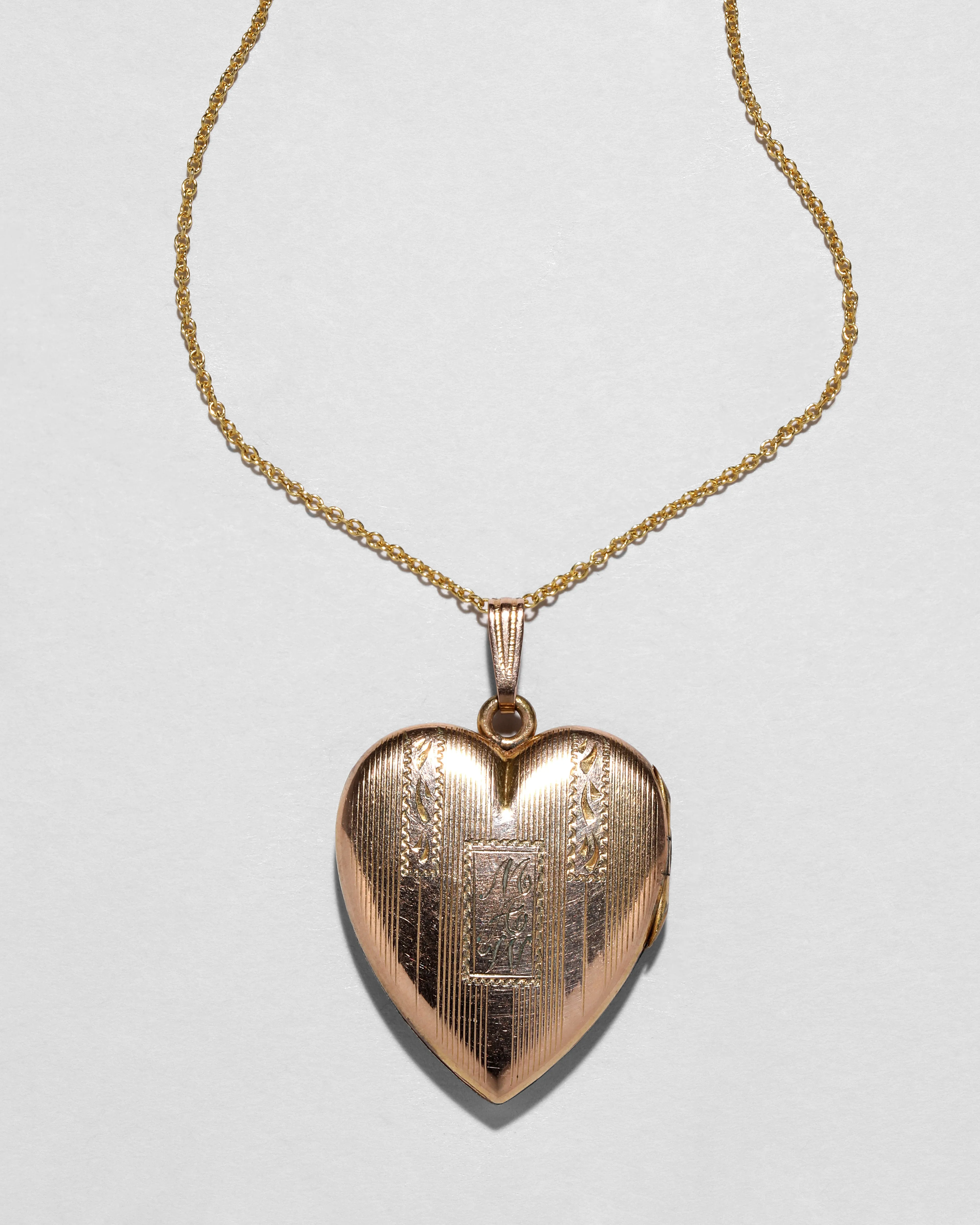 Antique 1920s 14k Gold Filled Engraved Pinstriped Heart Locket Necklace sold by Alexis Bittar