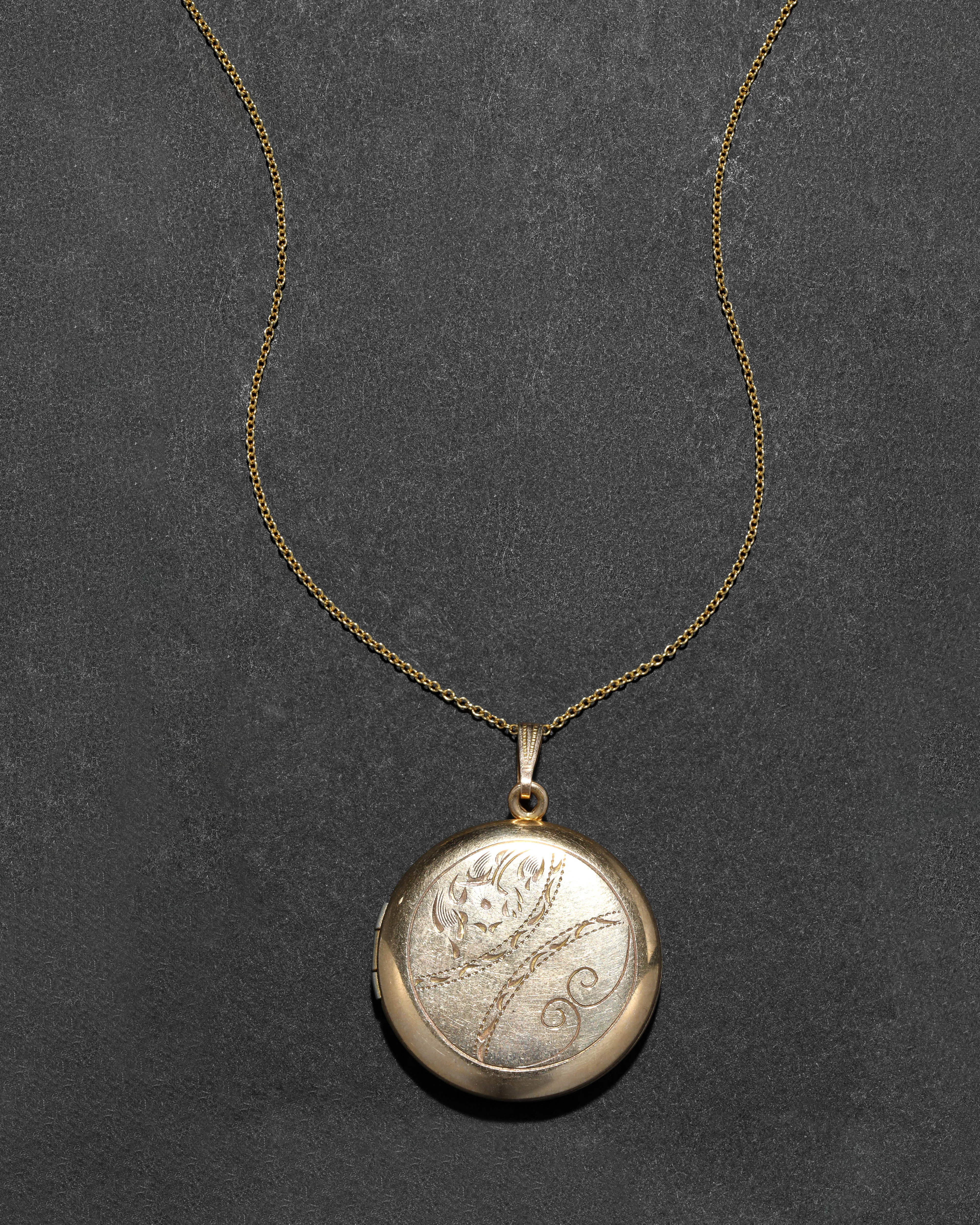 Vintage 1930s 12k Gold Filled Etched Petal Round Locket Necklace sold by Alexis Bittar