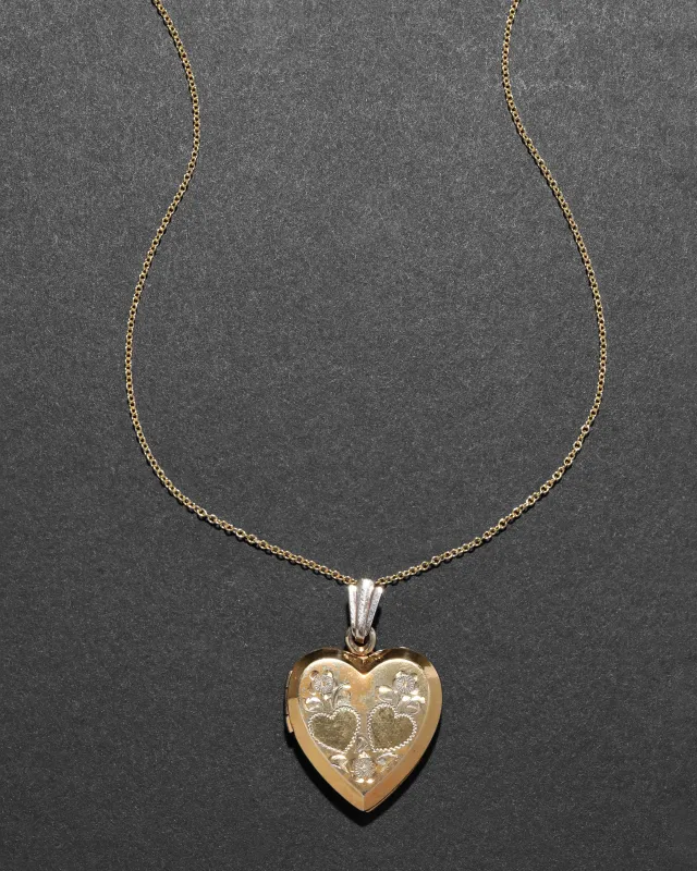 Vintage 1930s 12k Gold Fill Double Etched Heart Locket Necklace sold by Alexis Bittar