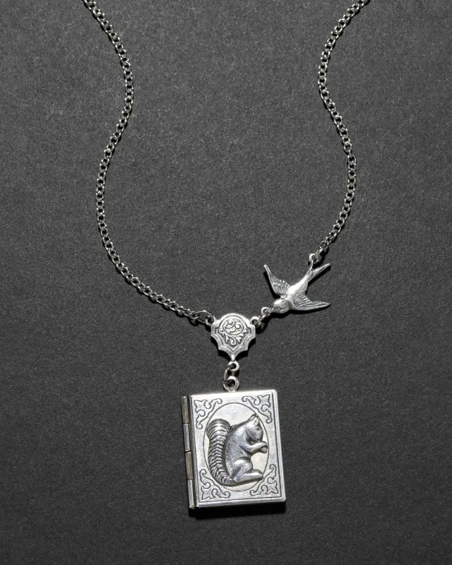 Vintage 1930s Sterling Silver Woodland Creatures Locket Necklace sold by Alexis Bittar