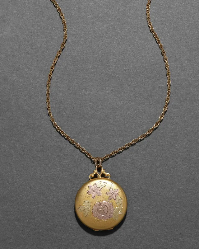Antique 1920s 14k Two-Tone Gold Fill Floral Locket Necklace sold by Alexis Bittar