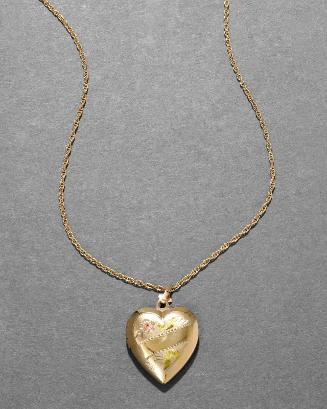 Antique 1920s 14k Tri-Color Gold Hand Etched Heart Locket Necklace sold by Alexis Bittar
