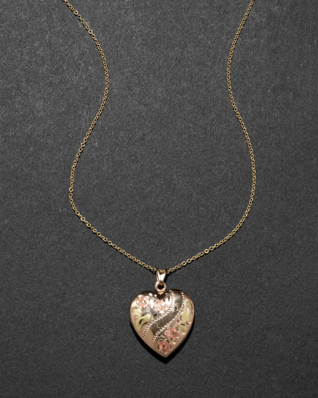 Vintage 1940s 14k Tri Color Gold Fill Floral Heart Locket Necklace sold by Alexis Bittar